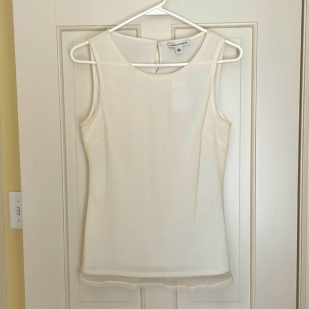 Off white sleeveless blouse, inner layer overlaid w sheer layer off white dots.